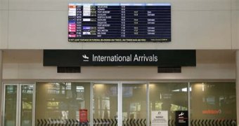 How many international flights arrive in Brisbane?